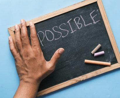 a chalkboard with the word possible written on it